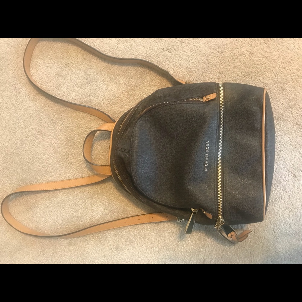 Authentic Michael Kors backpack style purse.